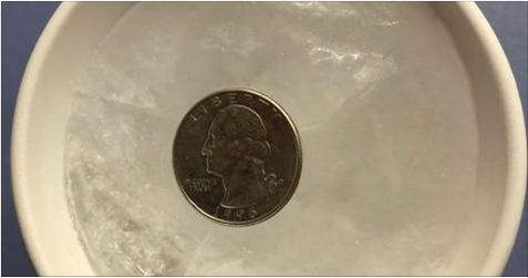 IF AWAY FROM YOUR HOME FOR VACATION OR A STORM, PUT A QUARTER IN A MUG OF ICE IN THE FREEZER