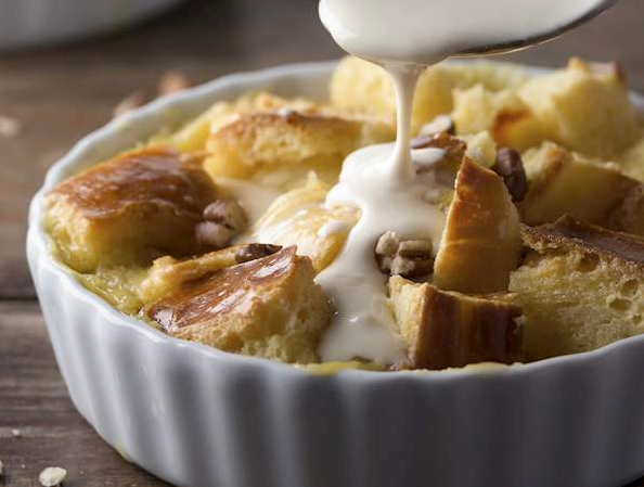 Old fashioned bread pudding with vanilla sauce
